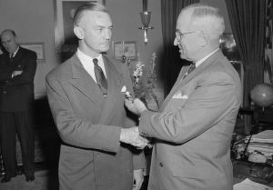 28 Mar 1949, Washington, DC, USA --- Surprise Decoration for Forrestal.  Washington, D.C.:  Retiring Secretary of Defense James V. Forrestal is shown as he received distinguished service medal from President Harry S. Truman in surprise ceremony in White House.  Forrestal's resignation became effective today, and the citation with medal haled his "exceptionally meritorious service in duty of great responsibility."  New secretary of defense is Louis A. Johnson. --- Image by © Bettmann/CORBIS